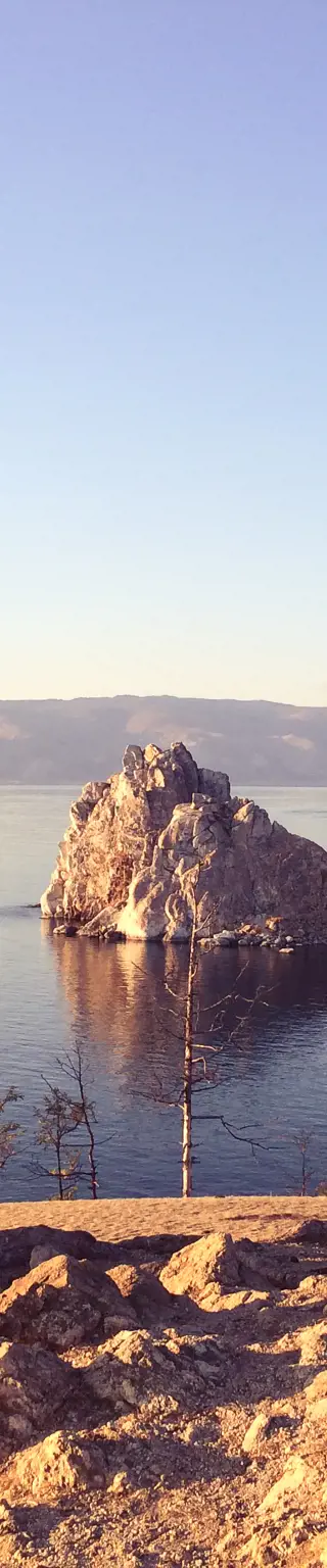 Die Russische Steppe aus der Transsibirischen Eisenbahn vorbei ziehen sehen